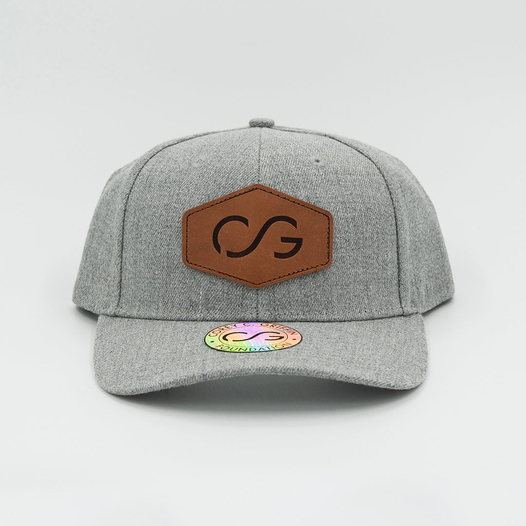 Heathered gray snapback with leather patch