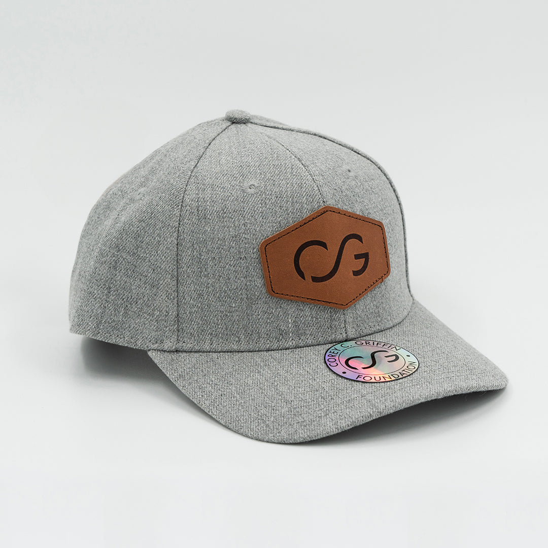 Heathered gray snapback with leather patch