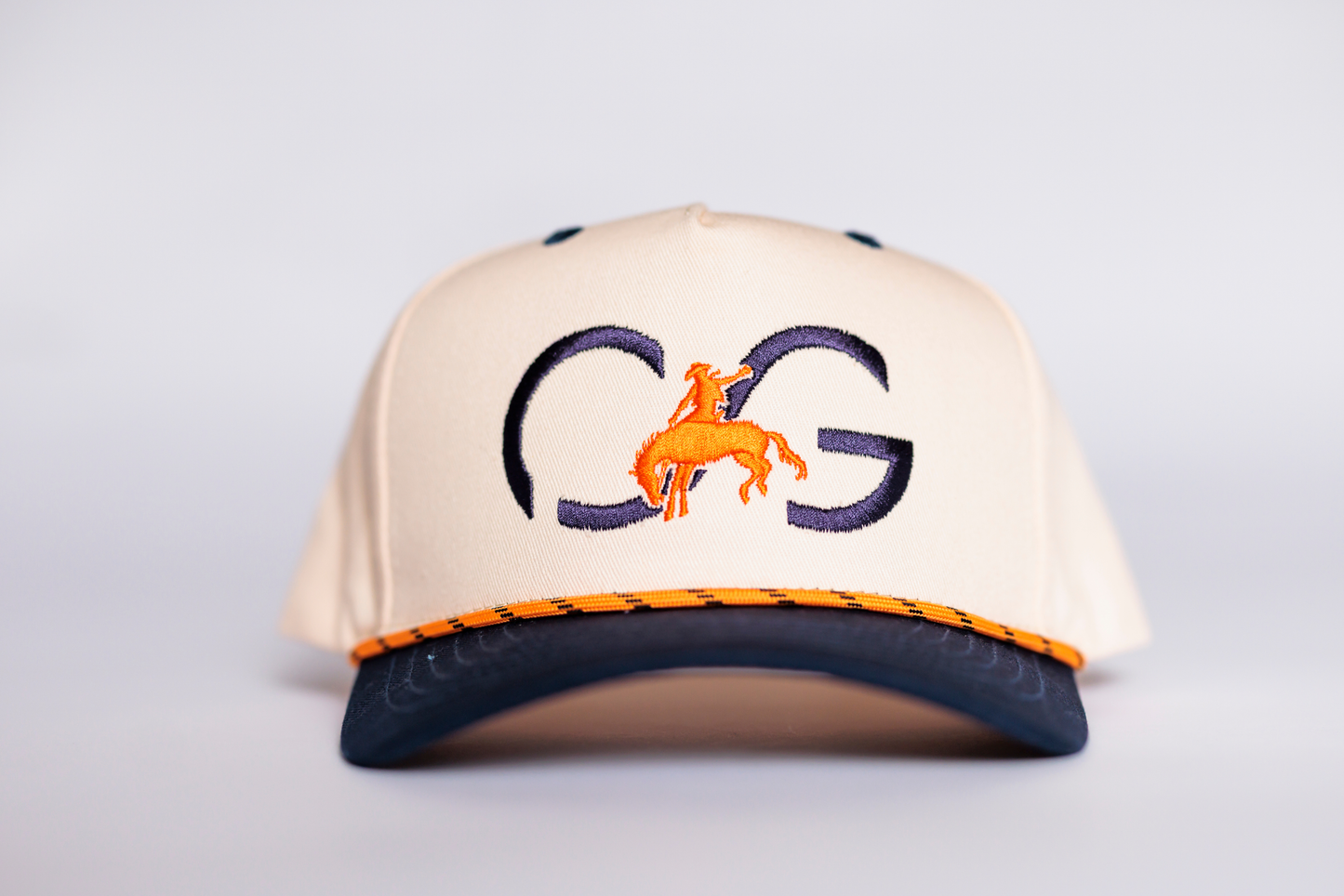 Cream and Navy CG with Orange Bronco and Rope